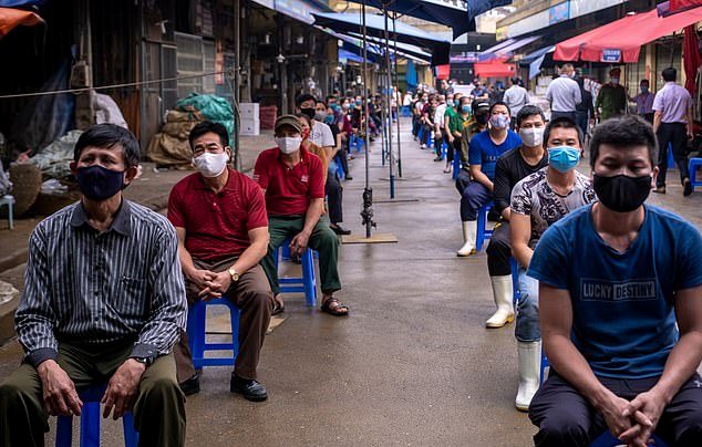 Vietnam queue for testing in Long Bien market
